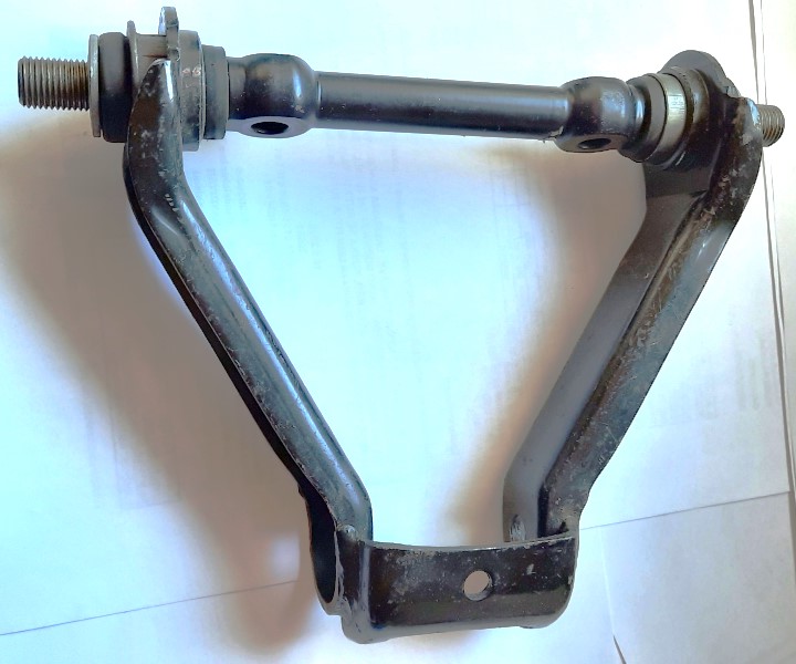 Etutukivarsi_ja_kiinnitysakseli_koriin